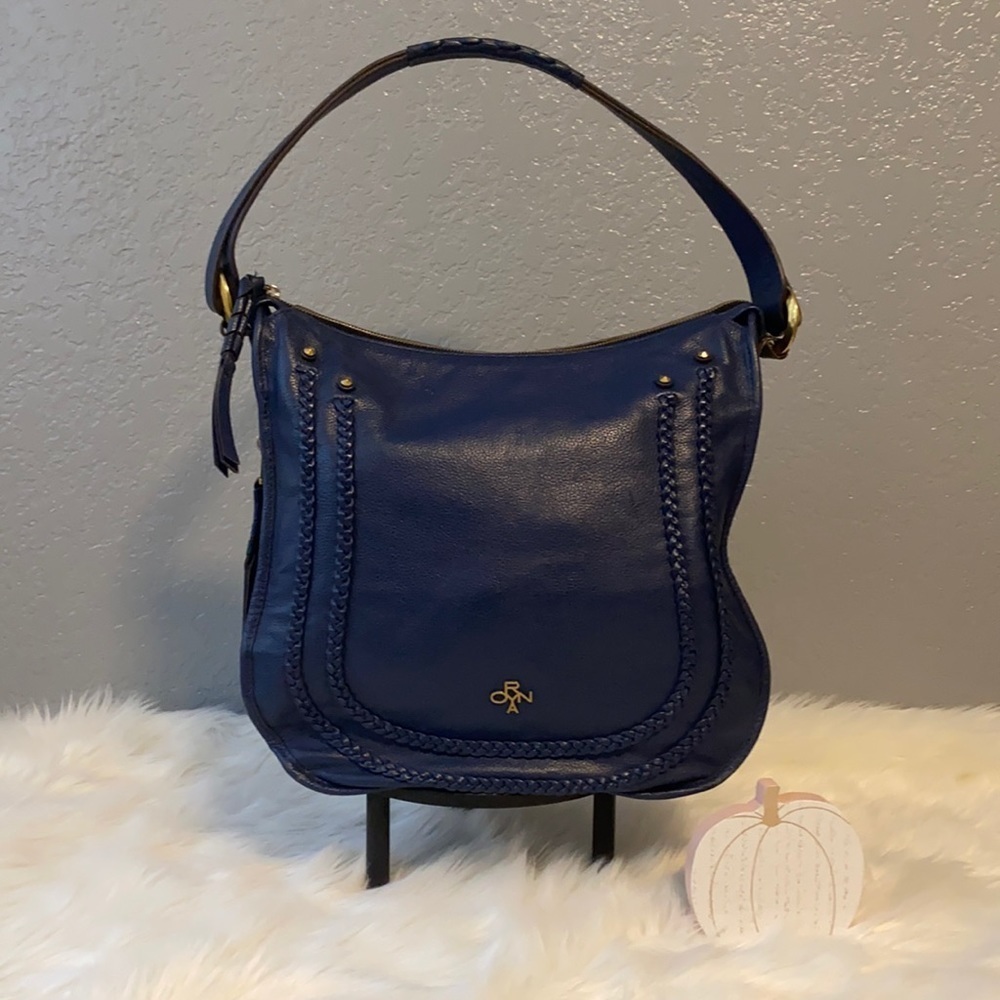 OrYANY Madelynโ Blue Leather Braided Hobo Purse